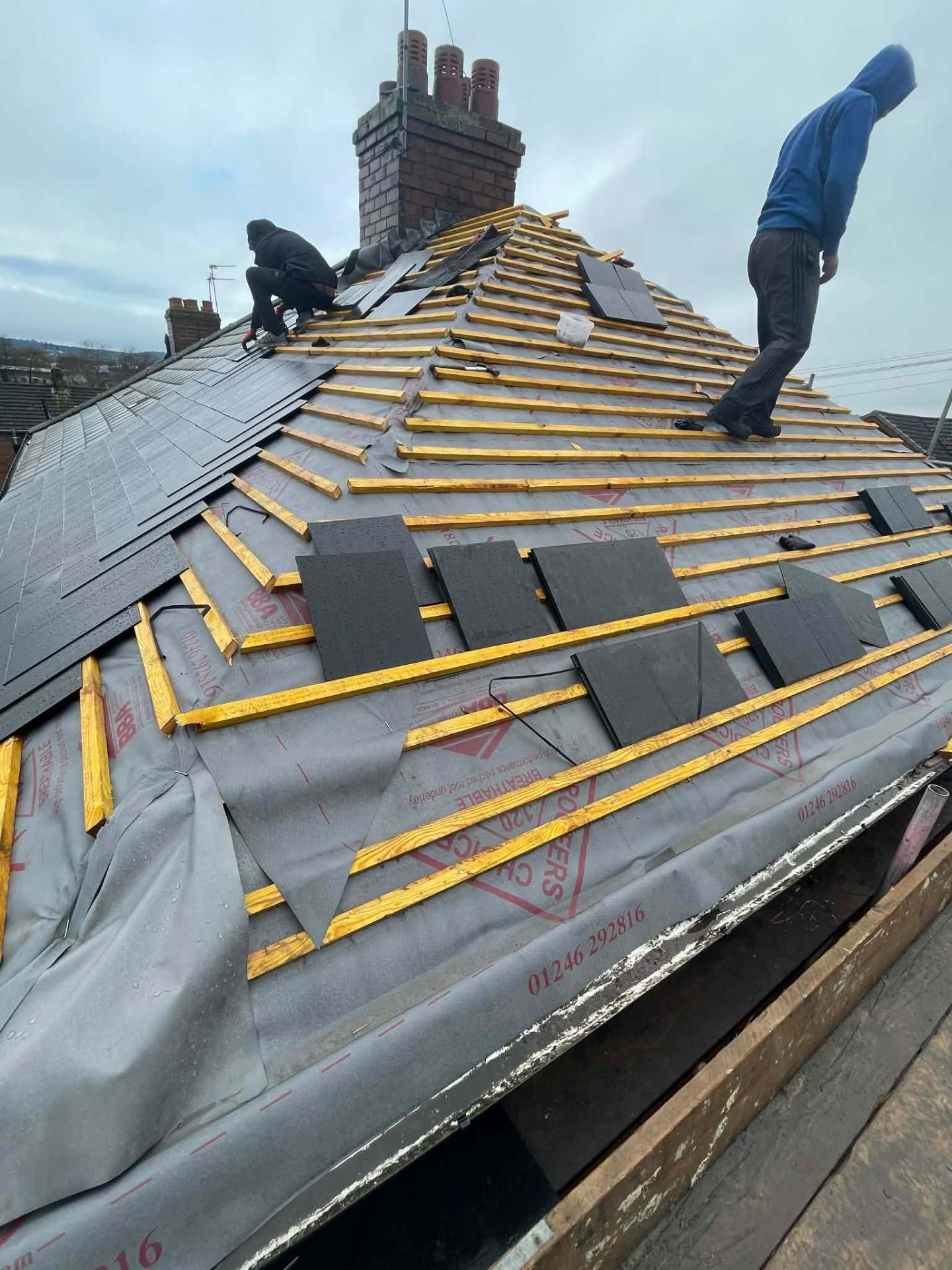 Roof re-felt and re-batten in progress on a hipped roof